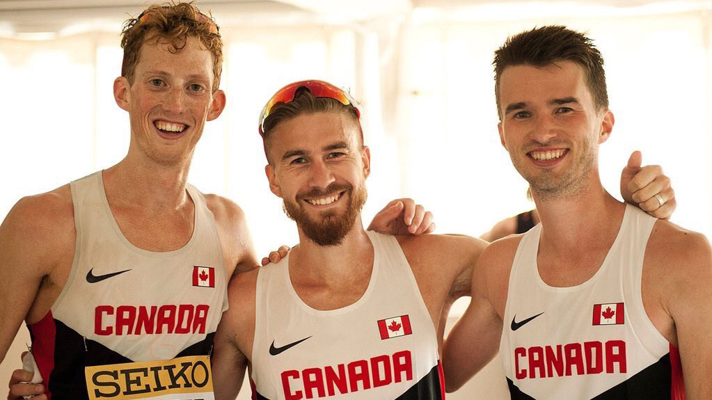 Race walkers Evan Dunfee, Ben Thorne and Ianaki Gomez celebrate a second place finish at the IAAF team championships on May 7, 2016. (Photo: Jon Mulkeen)