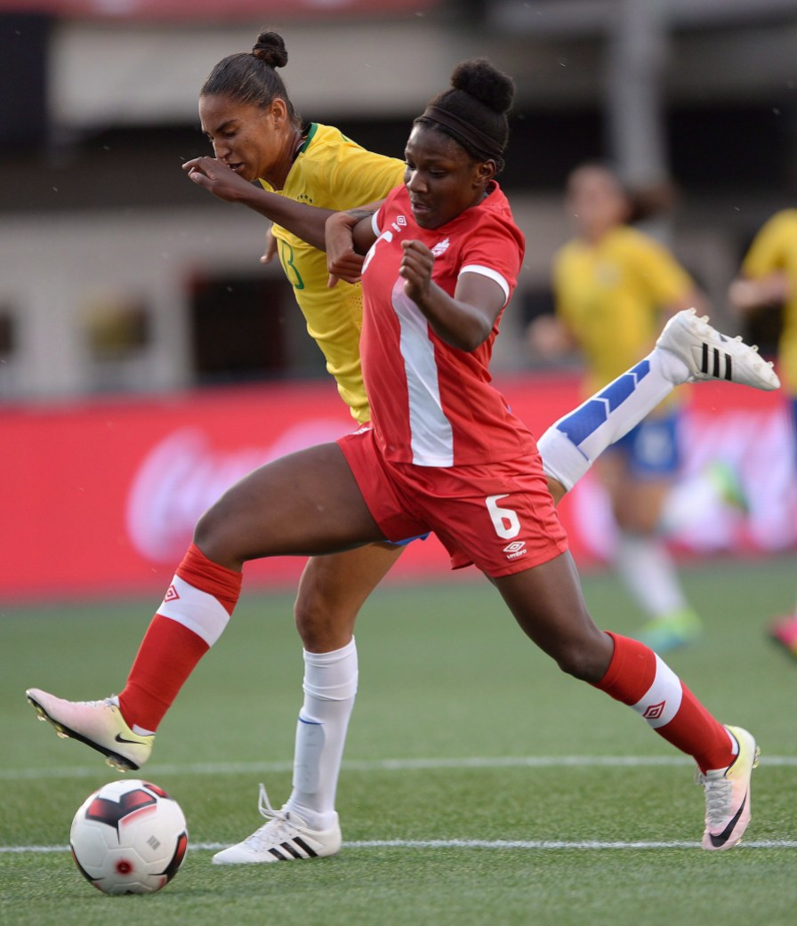 Deanne Rose, Poliana Barbosa Canada's Deanne Rose (6) moves the ball past Brazil's Poliana during first half international women's friendly soccer action in Ottawa on Tuesday, June 7, 2016. THE CANADIAN PRESS/Sean Kilpatrick