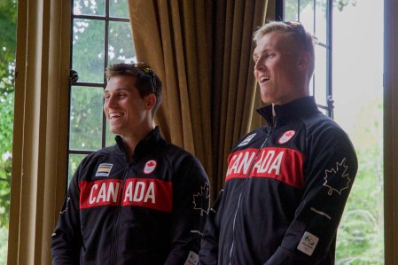 Kai Langerfeld and Tim Schrijver from men's four have a laugh at the Olympic rowing team announcement on June 28, 2016 in Toronto. Photo: Tavia Bakowski