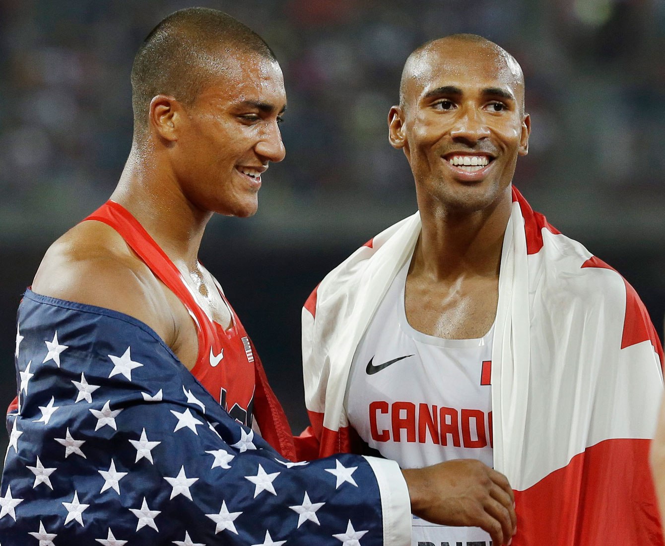 Ashton Eaton (left) and Damian Warner celebrate at the end of decathlon
