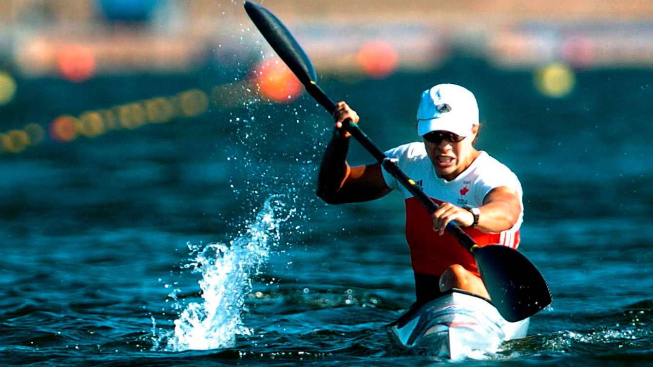 Canada's Caroline Brunet sits in her boat after crossing the finish line to win a bronze medal in the K1 500meter final at the Summer Olympics in Schinias, Greece, Saturday, August 28, 2004. 