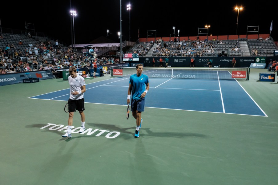 Canada’s Vasek Pospisil and Daniel Nestor play doubles at the Rogers Cup in Toronto on July 28, 2016. (Thomas Skrlj/COC)