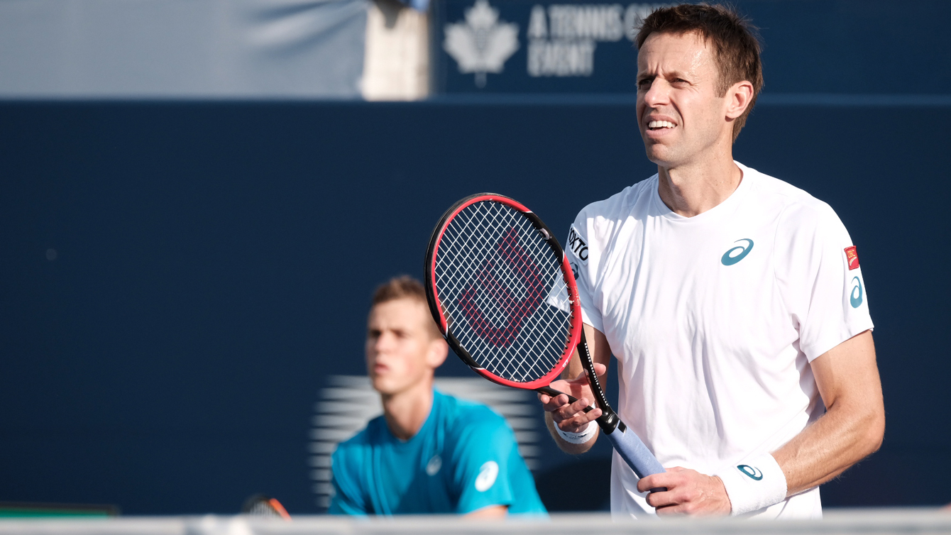 Canada's Daniel Nestor in doubles action with Vasek Pospisil at the Rogers Cup in Toronto on July 30, 2016. (Thomas Skrlj/COC)