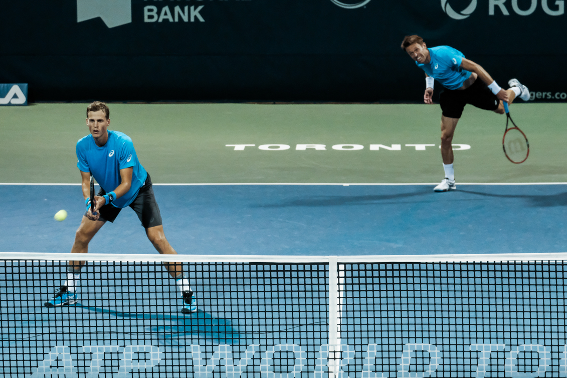 Canada’s Vasek Pospisil and Daniel Nestor play doubles in the quarterfinals of the Rogers Cup in Toronto on July 29, 2016. (Thomas Skrlj/COC)