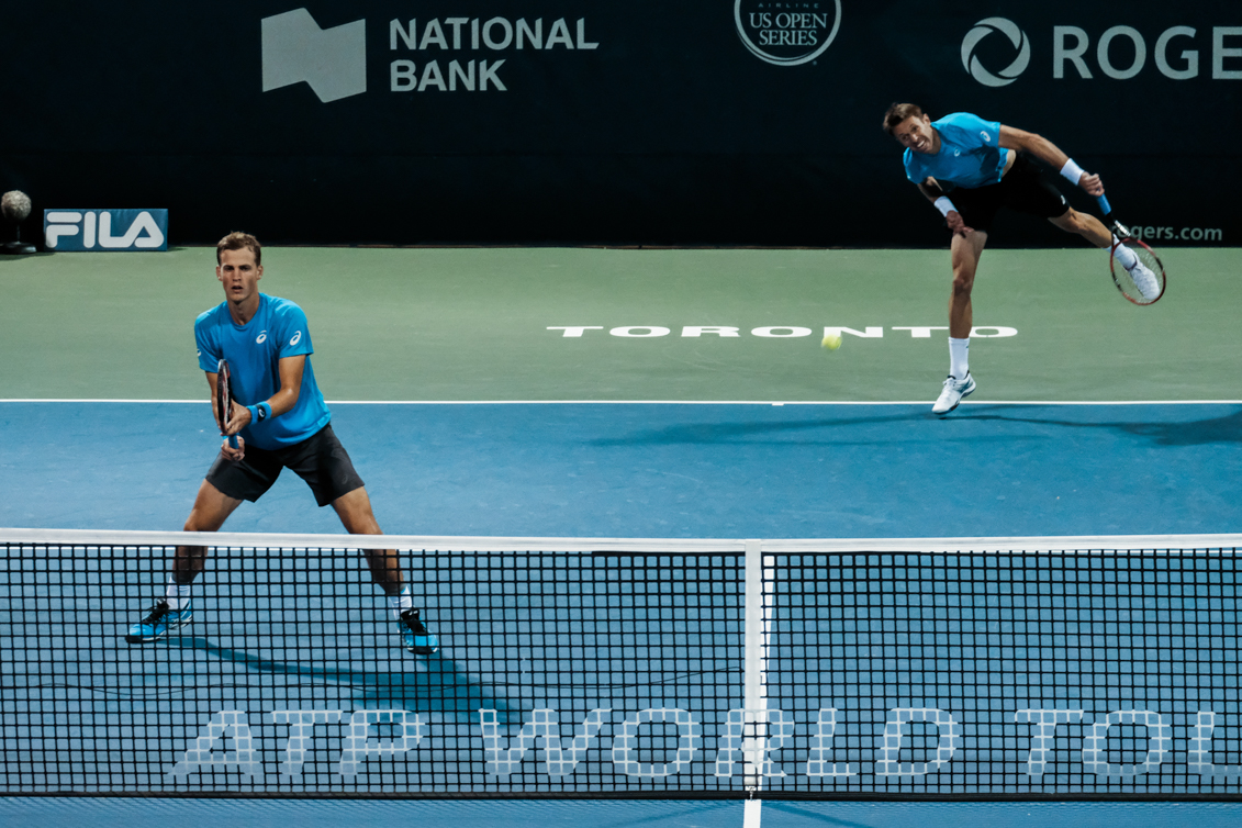 Canada’s Vasek Pospisil and Daniel Nestor play doubles in the quarterfinals of the Rogers Cup in Toronto on July 29, 2016. (Thomas Skrlj/COC)