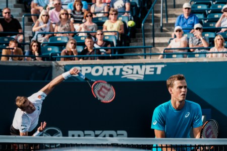 Canada’s Vasek Pospisil and Daniel Nestor play doubles in the semifinals of the Rogers Cup in Toronto on July 30, 2016. (Thomas Skrlj/COC)