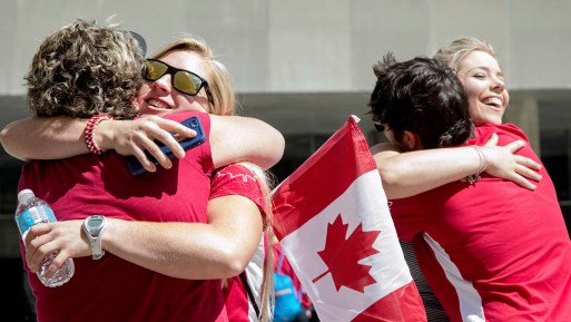 Britt Benn and Kayla Moleschi saying hello to family and friends before the Team Canada Rugby send-off on July 26, 2016. (Tavia Bakowski/COC)
