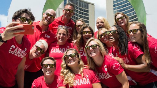 The Rio 2016 Rugby Canada Team posing in front of the "Toronto" sign at Nathan Phillips Square on July 26, 2016. (Tavia Bakowski/COC)