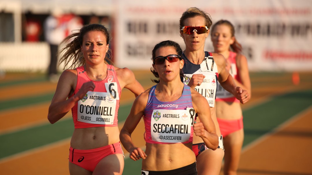Andrea Seccafien with other athletes trailing behind her