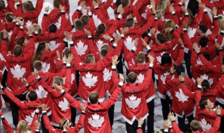 Rio Olympics Opening Ceremony Team Canada wave as they walk into the stadium during the opening ceremony for the 2016 Summer Olympics in Rio de Janeiro, Brazil, Friday, Aug. 5, 2016. (AP Photo/Matthias Schrader)