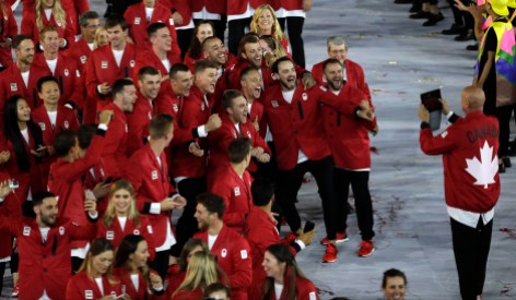 Rio Olympics Opening Ceremony Canadian athletes pose for a photograph as they march in during the opening ceremony for the 2016 Summer Olympics in Rio de Janeiro, Brazil, Friday, Aug. 5, 2016. (AP Photo/Matt Slocum)