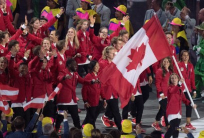 OLY Rio Opening Ceremony 20160805 Rosie MacLennan carries the flag as she leads Canada into the opening ceremonies for the 2016 Summer Olympics Friday August 5, 2016 in Rio de Janeiro, Brazil. THE CANADIAN PRESS/Frank Gunn