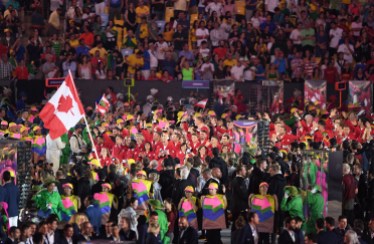 OLY Opening Ceremonies 20160805 Rosie MacLennan leads team Canada into the stadium during the opening ceremonies at the 2016 Olympic Games in Rio de Janeiro, Brazil on Friday, Aug. 5, 2016. THE CANADIAN PRESS/Sean Kilpatrick