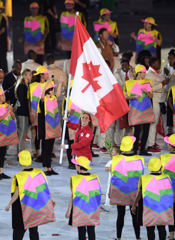 OLY Opening Ceremonies 20160805 Rosie MacLennan leads team Canada into the stadium during the opening ceremonies at the 2016 Olympic Games in Rio de Janeiro, Brazil on Friday, Aug. 5, 2016. THE CANADIAN PRESS/Sean Kilpatrick