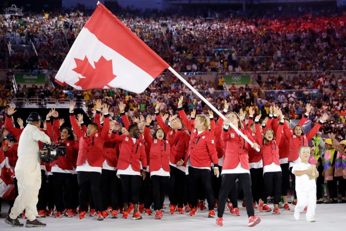 Rio Olympics Opening Ceremony Rosannagh Maclennan carries the flag of Canada during the opening ceremony for the 2016 Summer Olympics in Rio de Janeiro, Brazil, Friday, Aug. 5, 2016. (AP Photo/David J. Phillip)