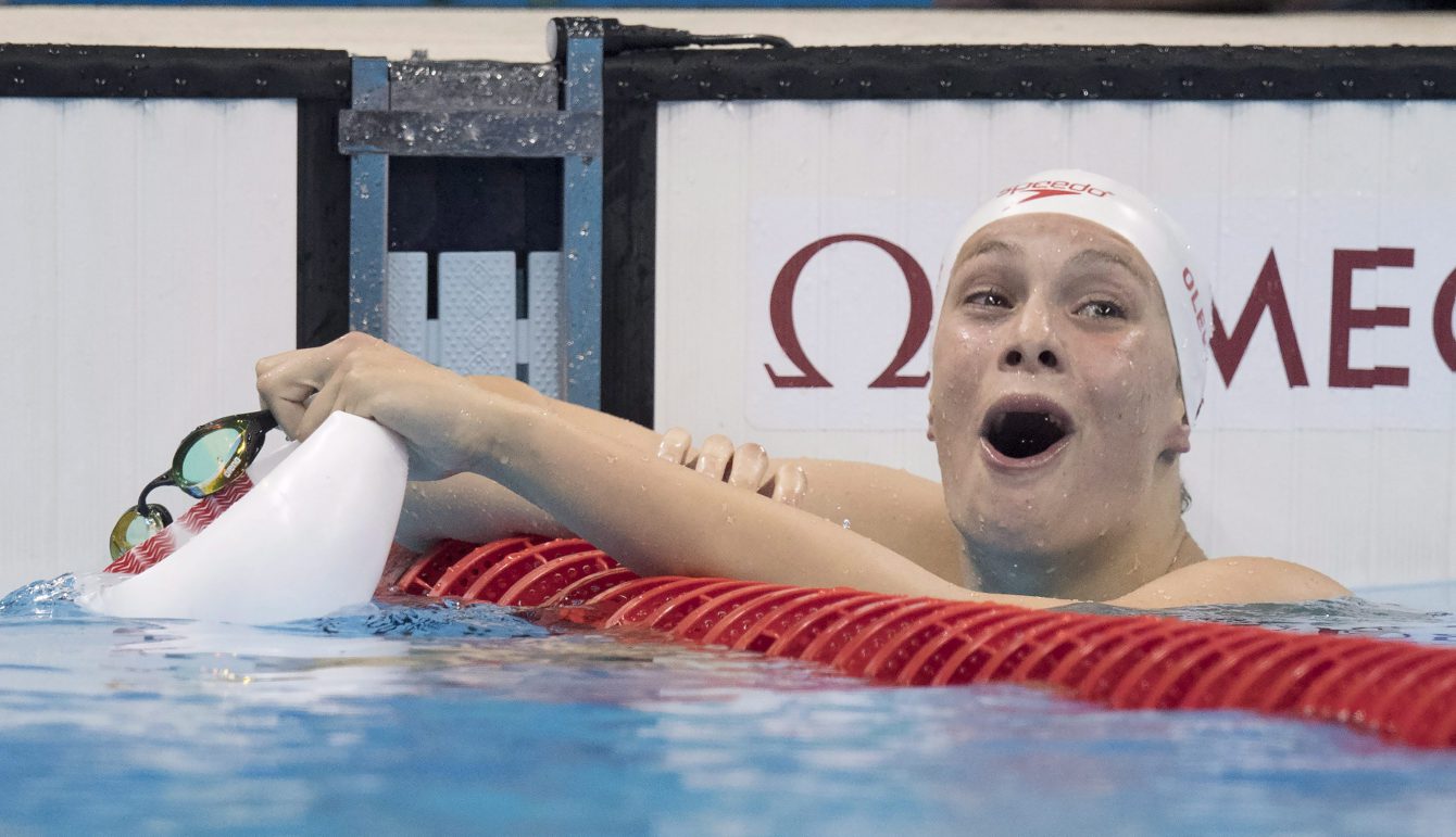 Canada's Penny Oleksiak reacts to her silver medal performance in the women's 100-metre butterfly at the 2016 Summer Olympics, Sunday, August 7, 2016 in Rio de Janeiro, Brazil. THE CANADIAN PRESS/Frank Gunn