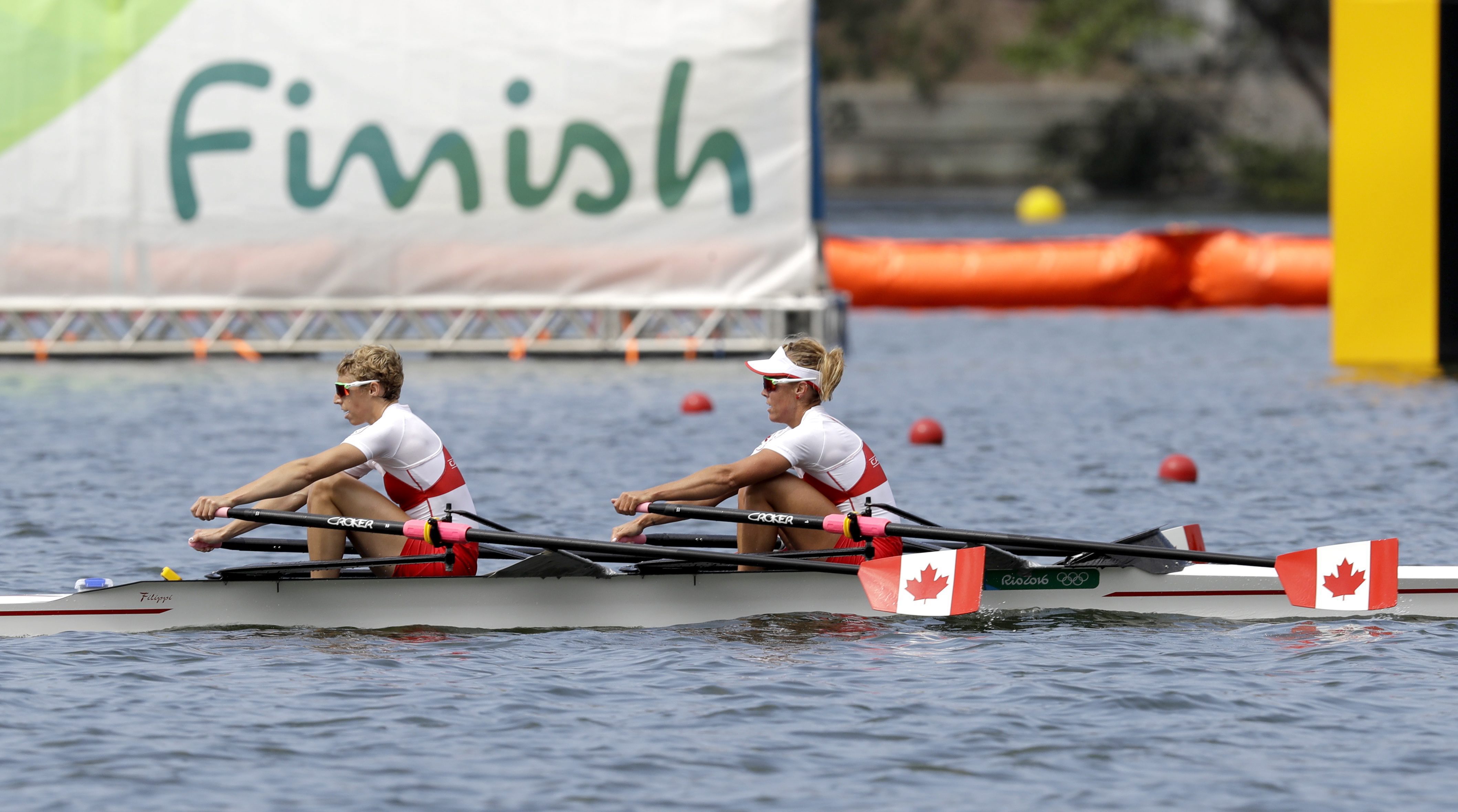 Lindsay Jennerich and Patricia Obee of Canada, compete in the women's rowing lightweight double sculls heat during the 2016 Summer Olympics in Rio de Janeiro, Brazil, Monday, Aug. 8, 2016. (AP Photo/Luca Bruno)
