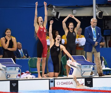 Canada's Taylor Ruck, left to right, Brittany MacLean, Katerine Savard and Penny Oleksiak take bronze in the women's 4 x 200m freestyle relay during the 2016 Olympic Summer Games in Rio de Janeiro, Brazil in Wednesday, Aug. 10, 2016. THE CANADIAN PRESS/Sean Kilpatrick