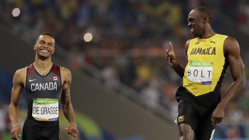 Jamaica's Usain Bolt, right, and Canada's Andre De Grasse compete in a men's 200-meter semifinal during the athletics competitions of the 2016 Summer Olympics at the Olympic stadium in Rio de Janeiro, Brazil, Wednesday, Aug. 17, 2016. (AP Photo/David J. Phillip)