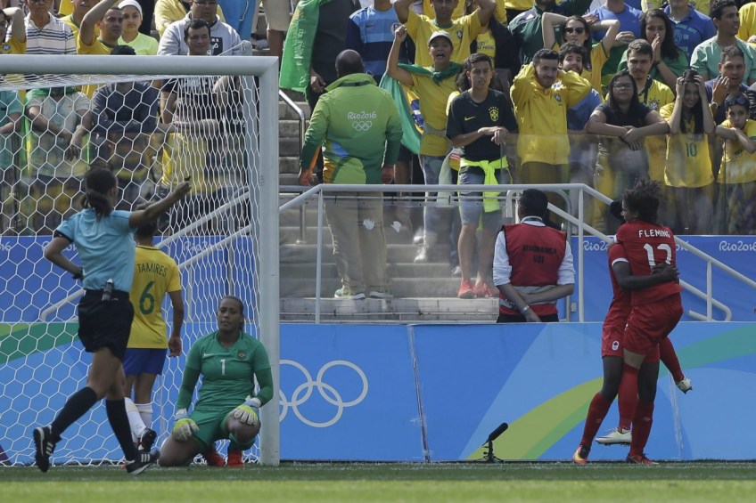 Rio 2016: Women's soccer bronze Canada's Deanne Rose, left, is congratulated after scoring her side's first goal by teammate Jessie Fleming during the bronze medal match of the women's Olympic football tournament between Brazil and Canada at the Arena Corinthians stadium in Sao Paulo, Friday Aug. 19, 2016. (AP Photo/Nelson Antoine)