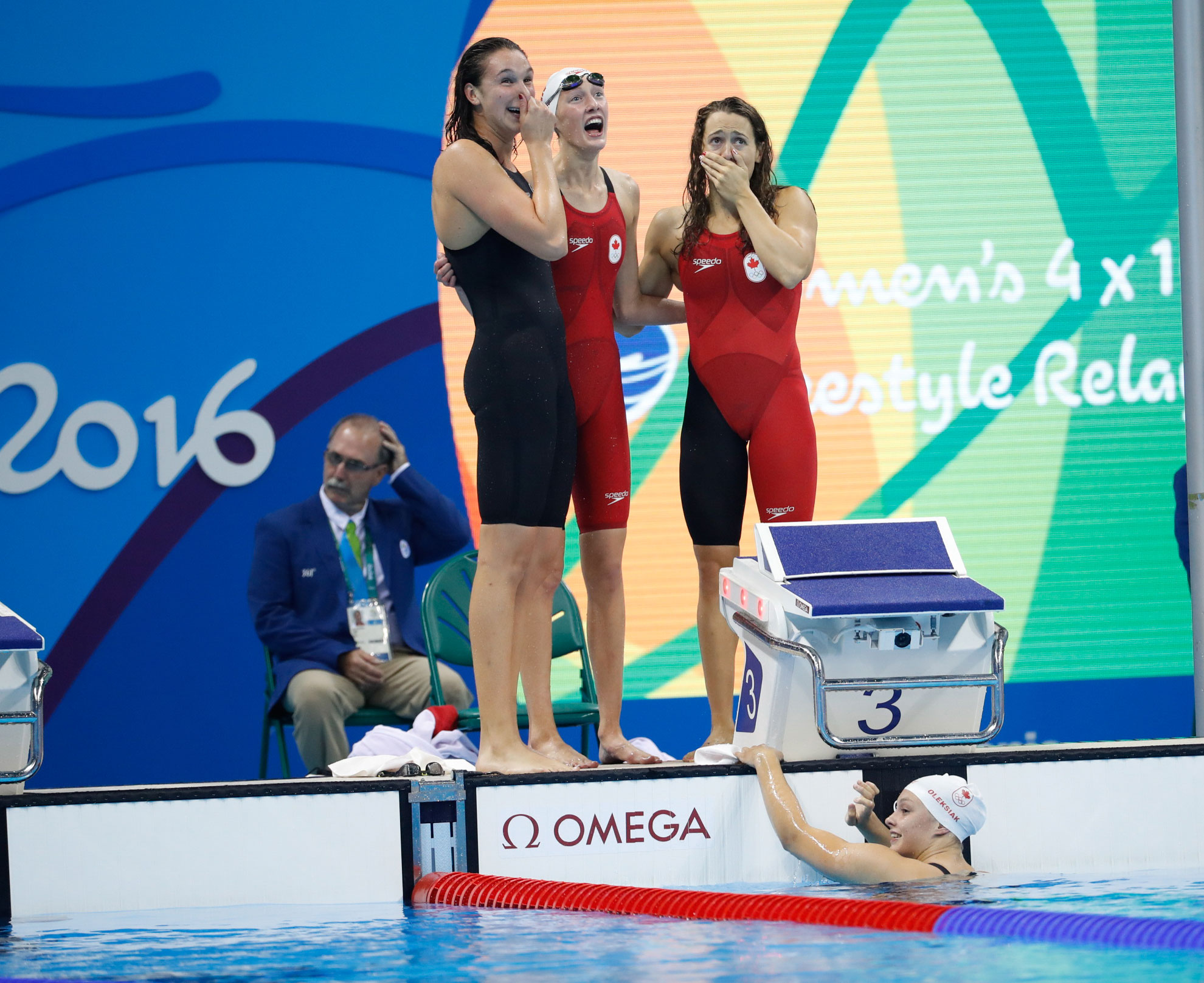 Rio 2016: 4x100m freestyle relay team realizes they've won an Olympic medal (Mark Blinch/COC). 