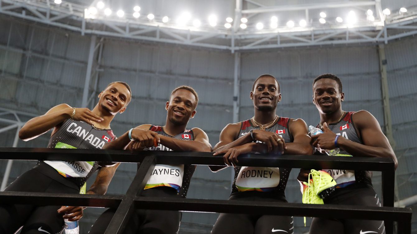 Canada's men's 4x100m relay team consisting of Andre De Grasse, Aaron Brown, Akeem Haynes and Brendon Rodney after winning bronze in the 4x100 relay at the Rio Olympic Games on August 19, 2016. (photo/ Stephen Hosier)