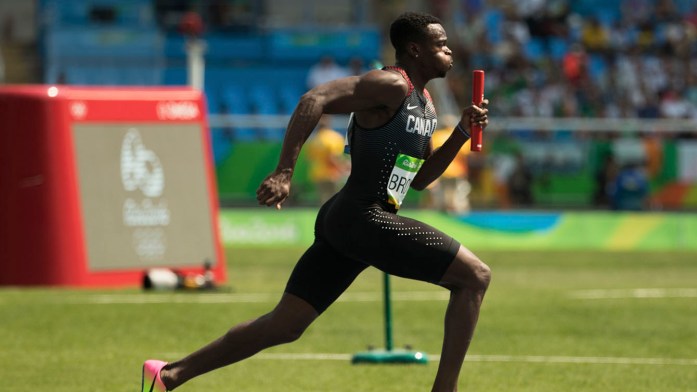 Aaron Brown competes in the men's 4x100m heats during Rio 2016.