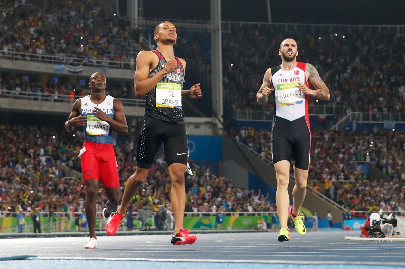 Andre De Grasse crossing the finish line in the men's 200-metre final at the 2016 Summer Olympics in Rio de Janeiro, Brazil on Thursday, August 18, 2016.  (photo/ Mark Blinch)