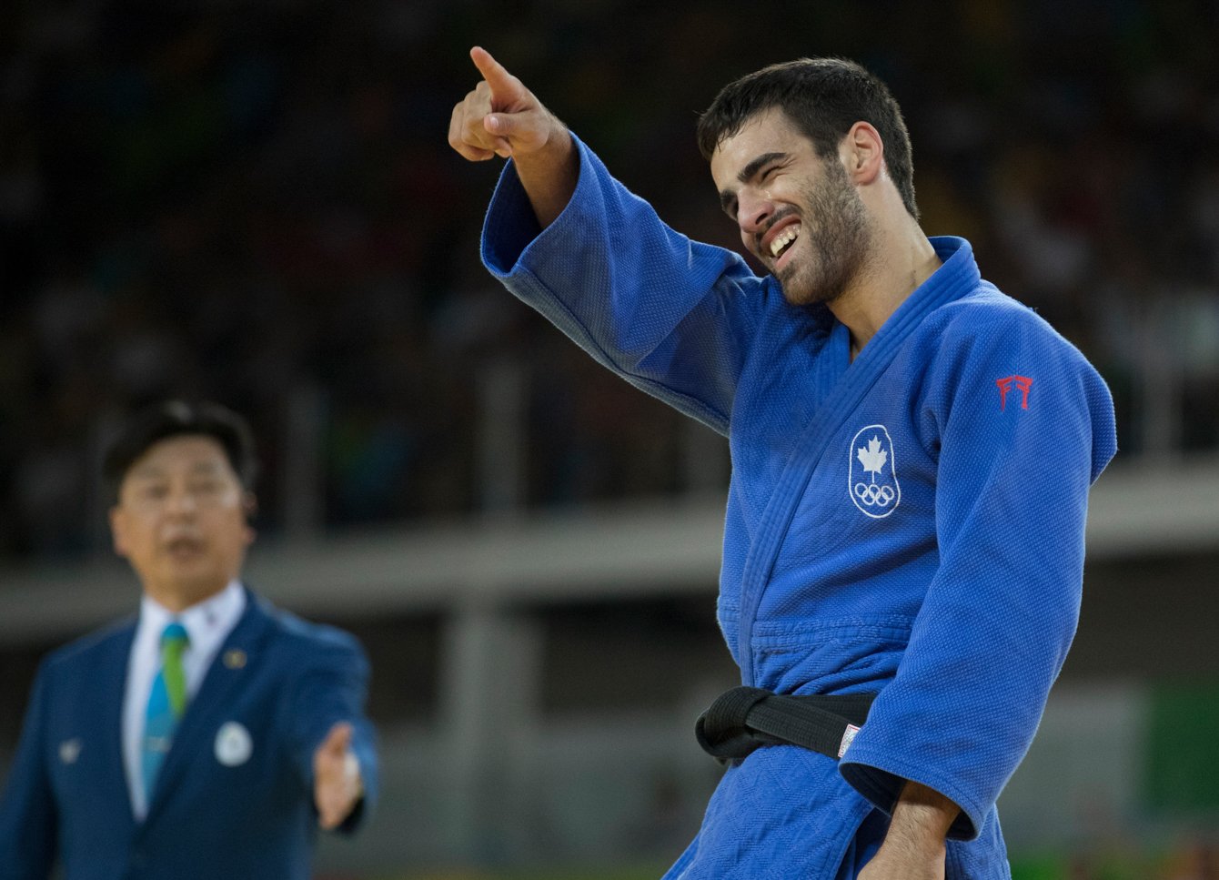 Canada's Antoine Bouchard celebrates his win over Mikhail Puliaev of Russia during Men's 66kg Judo, second-round action at the Olympic games in Rio de Janeiro, Brazil, Sunday, August 7, 2016. COC Photo by Jason Ransom