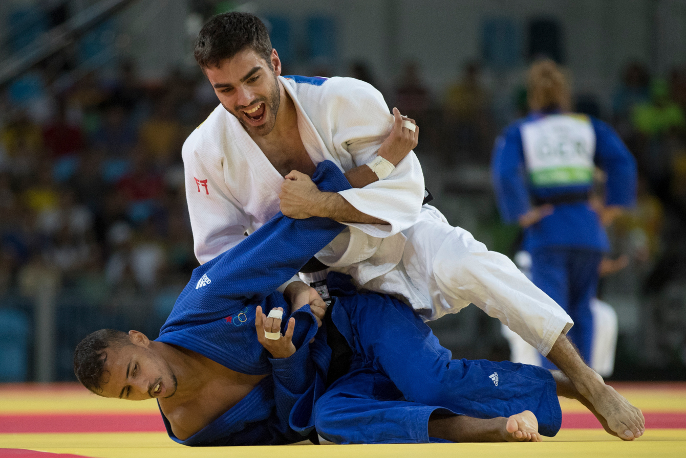 Canada's Antoine Bouchard takes on Imad Bassou of Morocco during Men's 66kg Judo, third-round action at the Olympic games in Rio de Janeiro, Brazil, Sunday, August 7, 2016. COC Photo by Jason Ransom