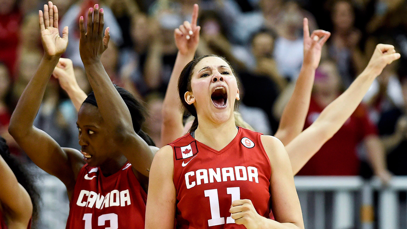 Canada forward Natalie Achonwa (11) reacts with her teammates after defeating the United States during second half to win the gold medal at the Pan American Games in Toronto on Monday, July 20, 2015. THE CANADIAN PRESS/Nathan Denette