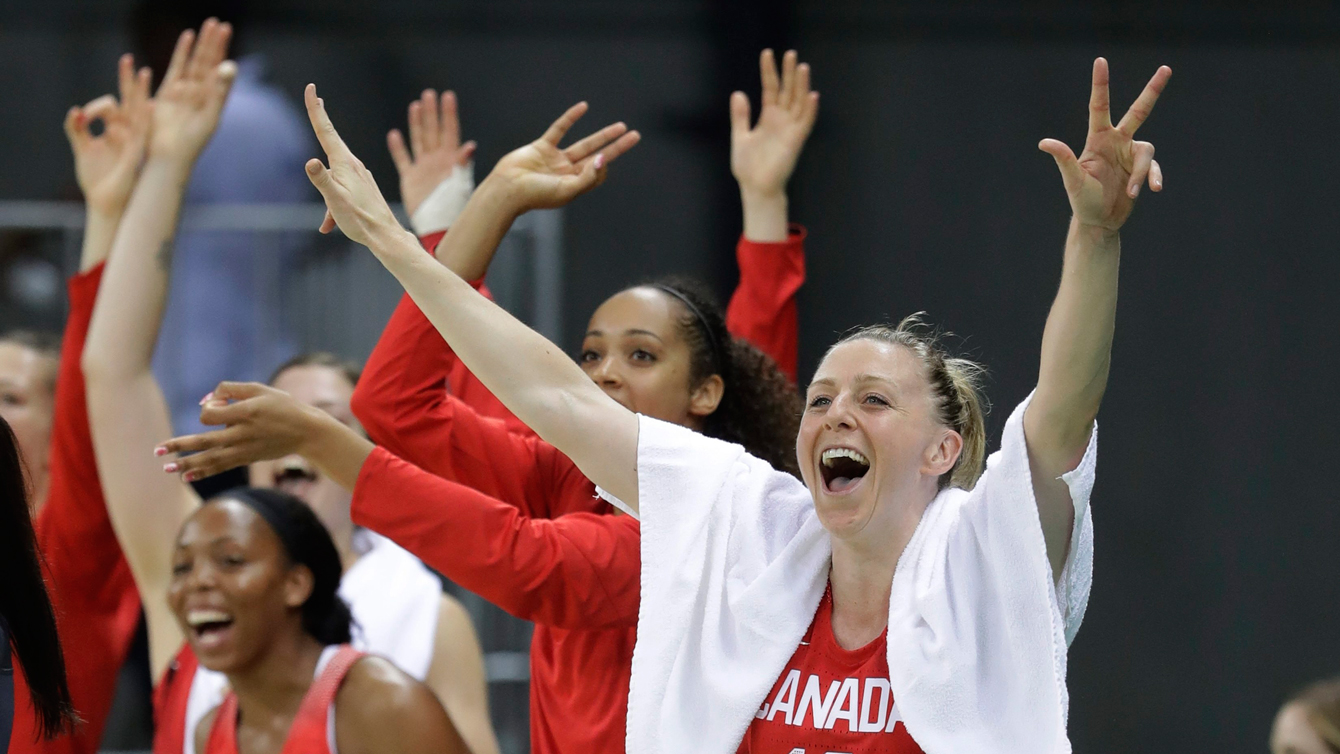 Canada forward Lizanne Murphy and teammates react after a three-point play during the second half of a women's basketball game against Chin at the Youth Center at the 2016 Summer Olympics in Rio de Janeiro, Brazil, Saturday, Aug. 6, 2016. (AP Photo/Carlos Osorio)