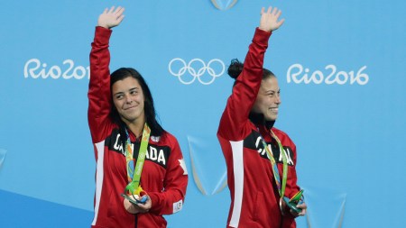 Meaghan Benfeito and Roseline Filion accept their bronze medal for 10m platform diving on August 9, 2016 at Rio 2016.