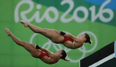 Meaghan Benfeito and Roseline Filion of Team Canada in the third round of the Women's Synchronised 10m Platform, on August 9, 2016 in Rio. COC Photo/Jason Ransom