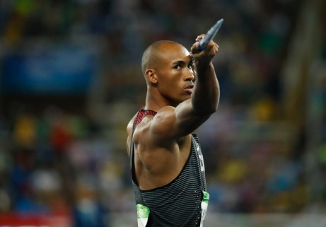 Damian Warner tosses a javelin during Olympic decathlon on August 18, 2016 in Rio de Janeiro. (photo/ Mark Blinch)
