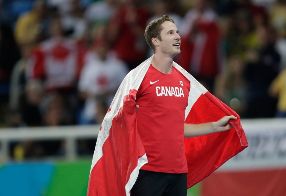 Canada's Derek Drouin celebrates after finishing first in the men's high jump final at the 2016 Summer Olympics in Rio de Janeiro, Brazil, Tuesday, August 16, 2016. (photo/Jason Ransom)