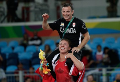 Erica Wiebe carries her coach after winning 75kg wrestling gold at Rio 2016 (COC/David Jackson)