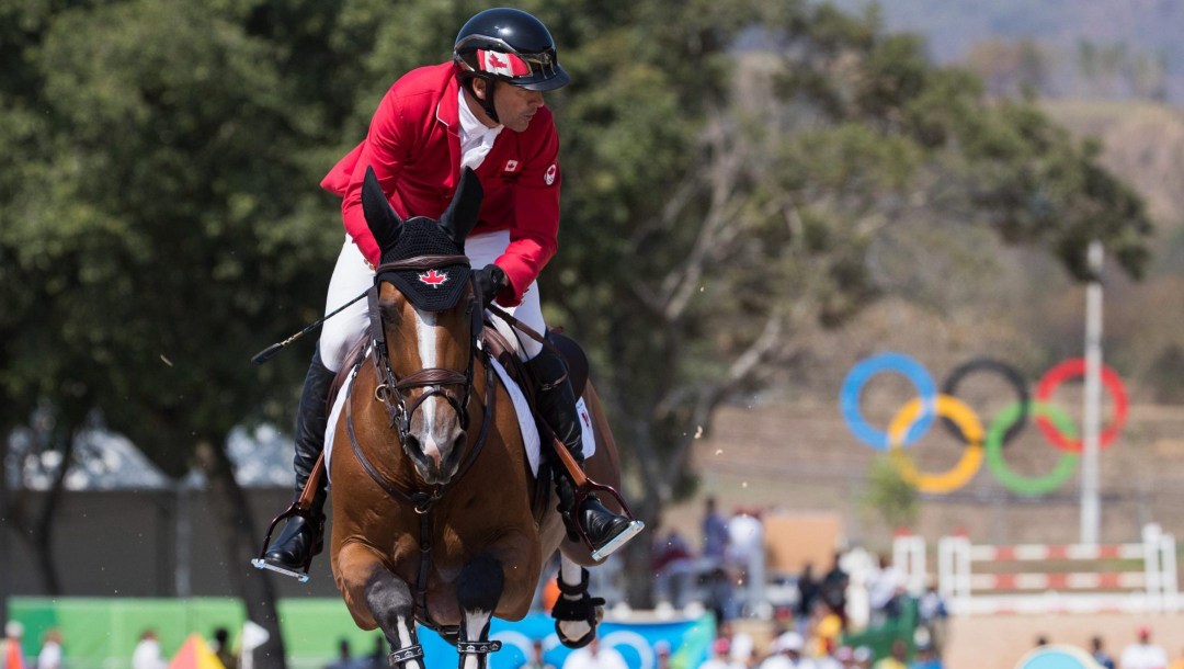Canada's Eric Lamaze aboard his horse Fine Lady 5 competes during Equestrian Individual Jumping Final Round A at the Olympic games in Rio de Janeiro, Brazil, Friday August 19, 2016. COC Photo/Mark Blinch
