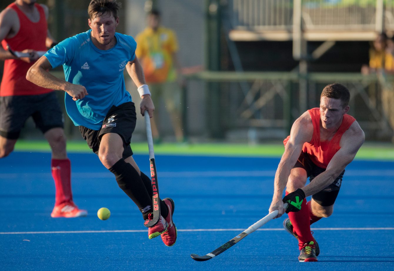 Scott Tupper passes the ball during a friendly match against New Zealand