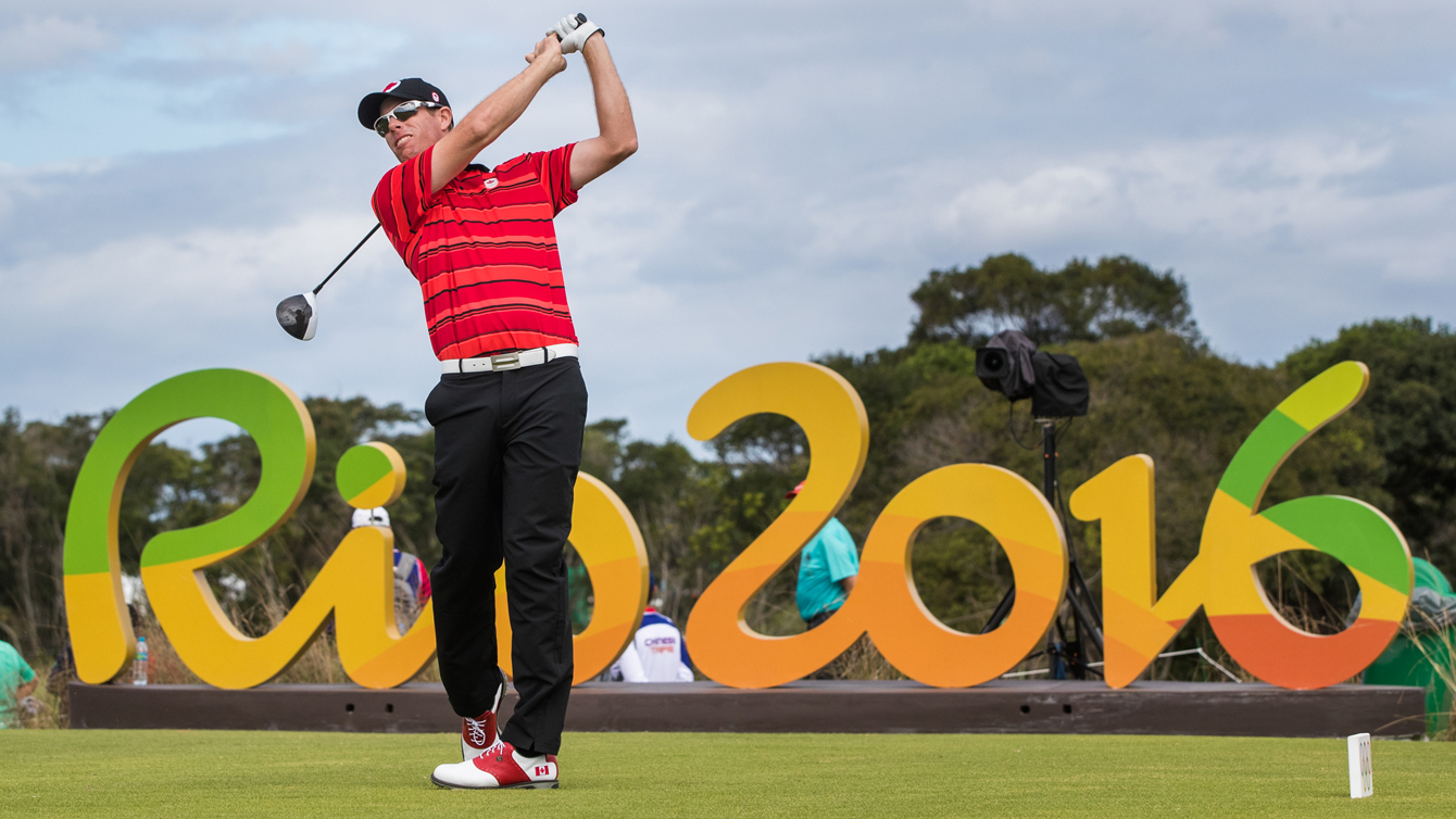 David Hearn tees off in front of Rio 2016 sign
