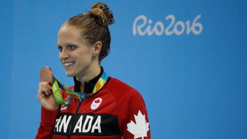 Canada's Hilary Caldwell with her bronze medal from winning the bronze medal in the women's 200-meter backstroke final during the swimming competitions at the 2016 Summer Olympics, Thursday, Aug. 12, 2016, in Rio de Janeiro, Brazil. (COC Photo/Mark Blinch)