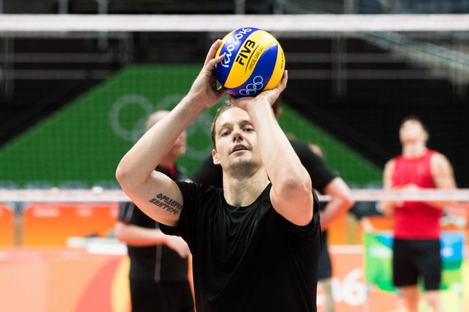 Team Canada's Frederic Winters throws the ball during their men's team volleyball practice ahead of the Olympic games in Rio de Janeiro, Brazil, Wednesday August 3, 2016. COC Photo/Mark Blinch