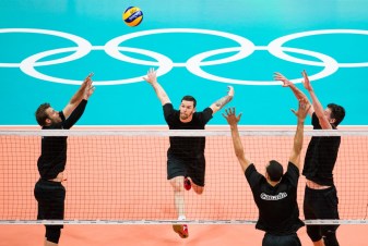 Team Canada's Steve Marshall, centre, plays the ball during their men's team volleyball practice ahead of the Olympic games in Rio de Janeiro, Brazil, Wednesday August 3, 2016. COC Photo/Mark Blinch
