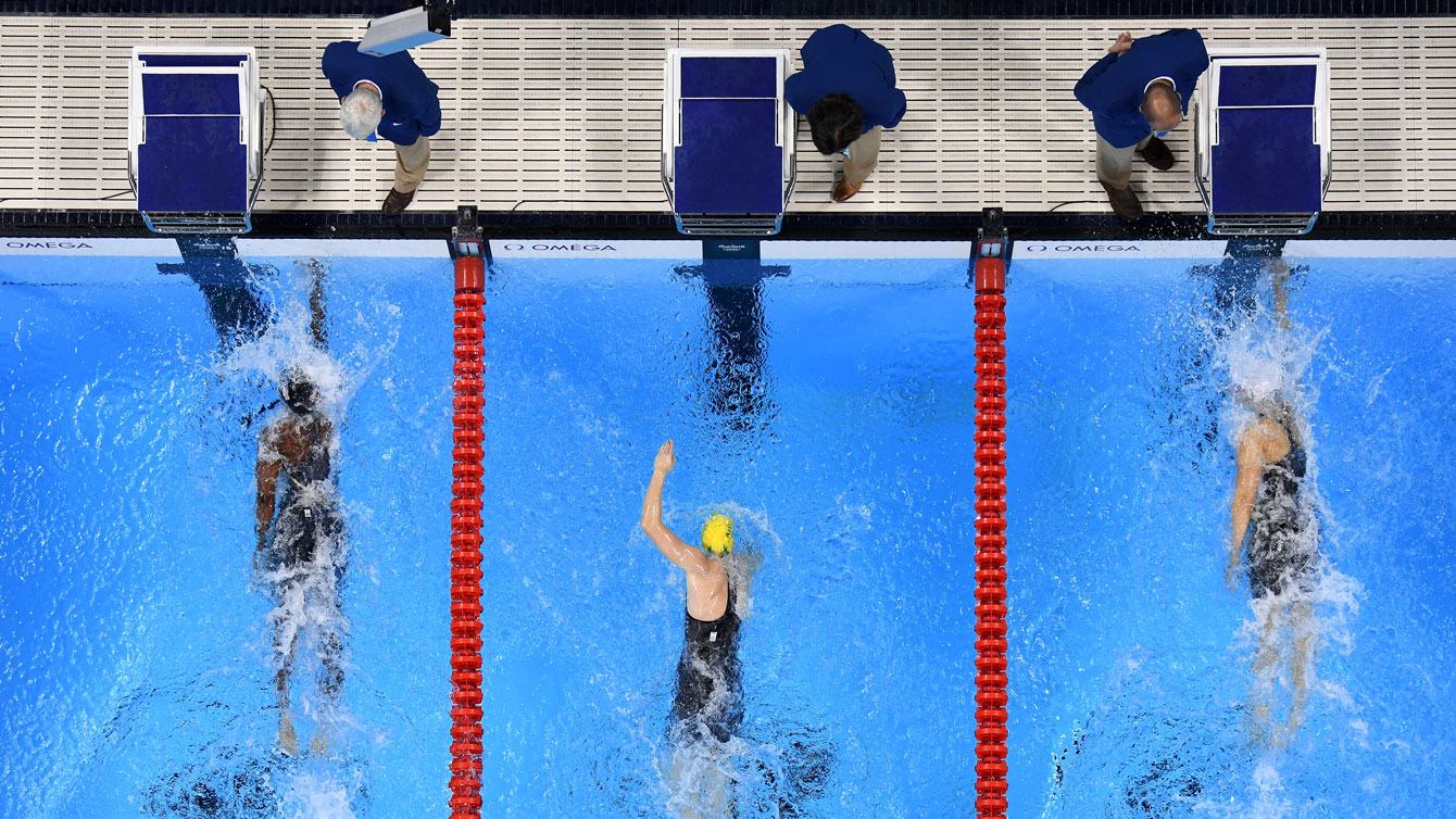 Penny Oleksiak (right) and Simone Manuel (left) touch the wall simultaneously in the 100m freestyle at the Olympic Games in Rio de Janeiro on August 11, 2016.