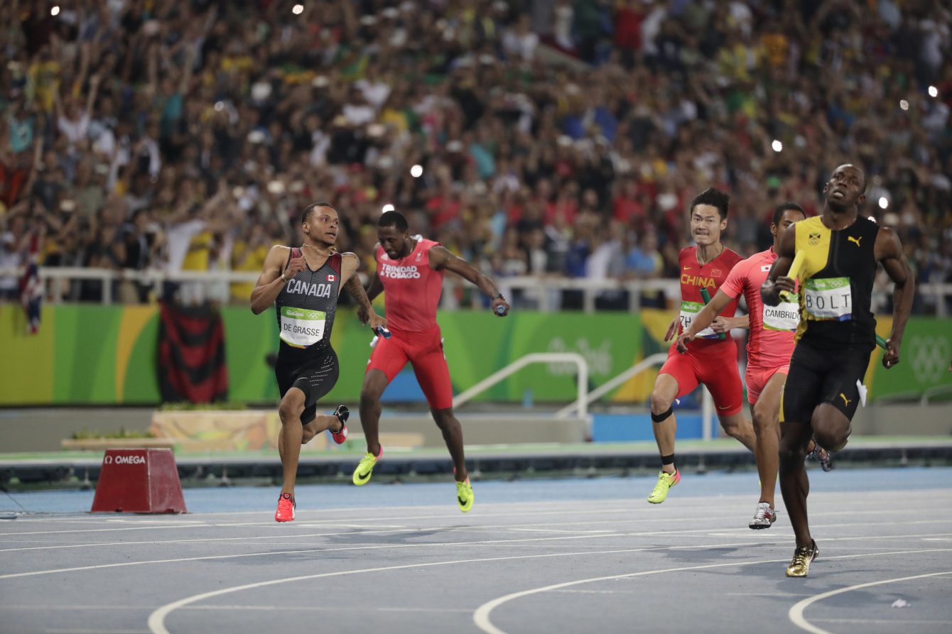 Canada's Andre De Grasse, during the men's 4x100-metre relay final at the 2016 Summer Olympics in Rio de Janeiro, Brazil on Friday, August 19, 2016. (photo/Mark Blinch)