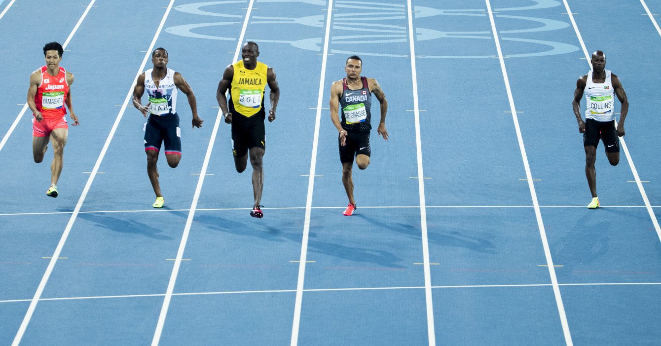 Andre DeGrasse during the 100m seminfinal (photo/ Stephen Hosier)