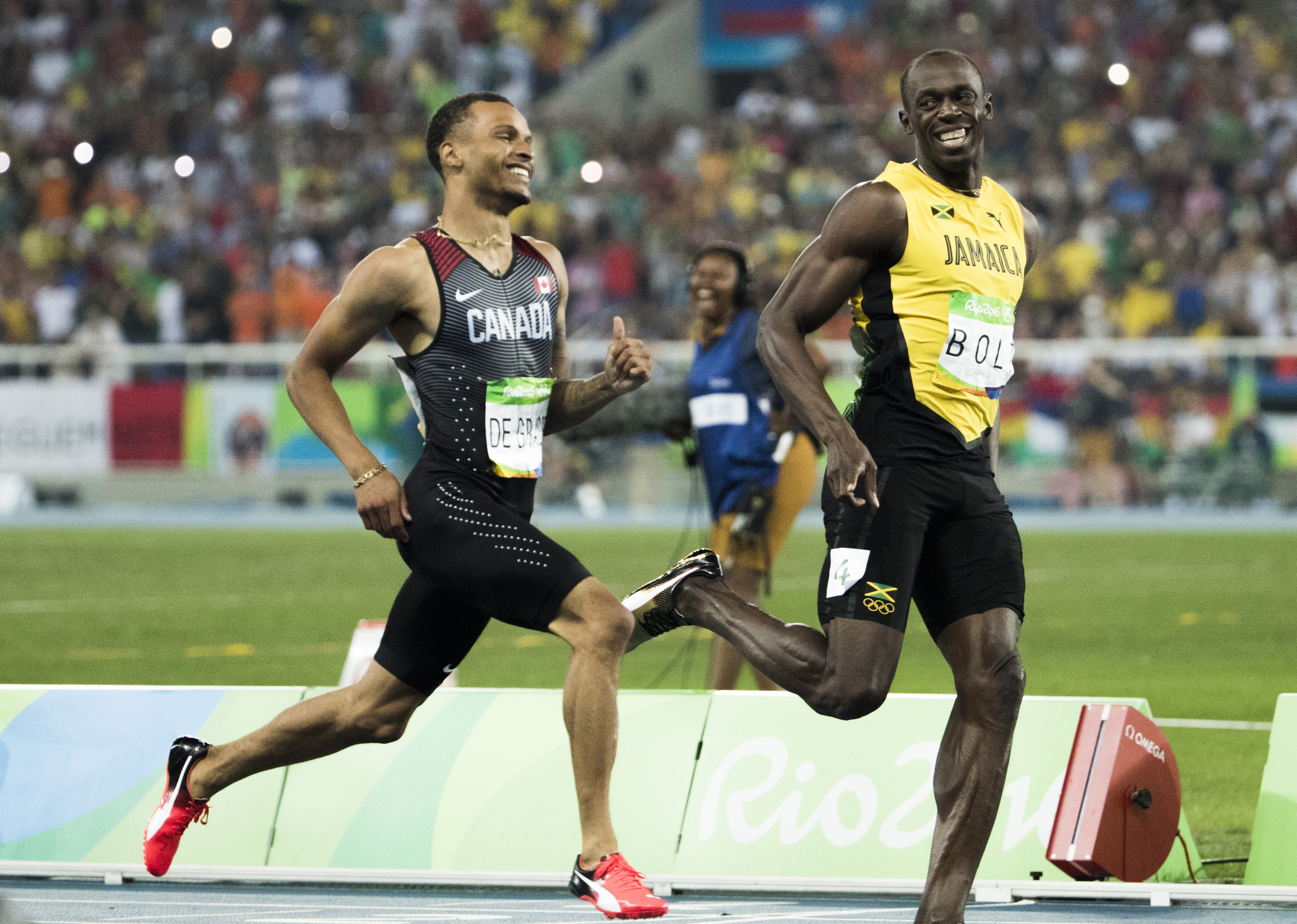 Andre De Grasse and Usain Bolt compete in the Men's 200m Semi Final at the Olympic Games in Rio de Janeiro, Brazil, Wednesday, August 17, 2016. COC Photo by Stephen Hosier