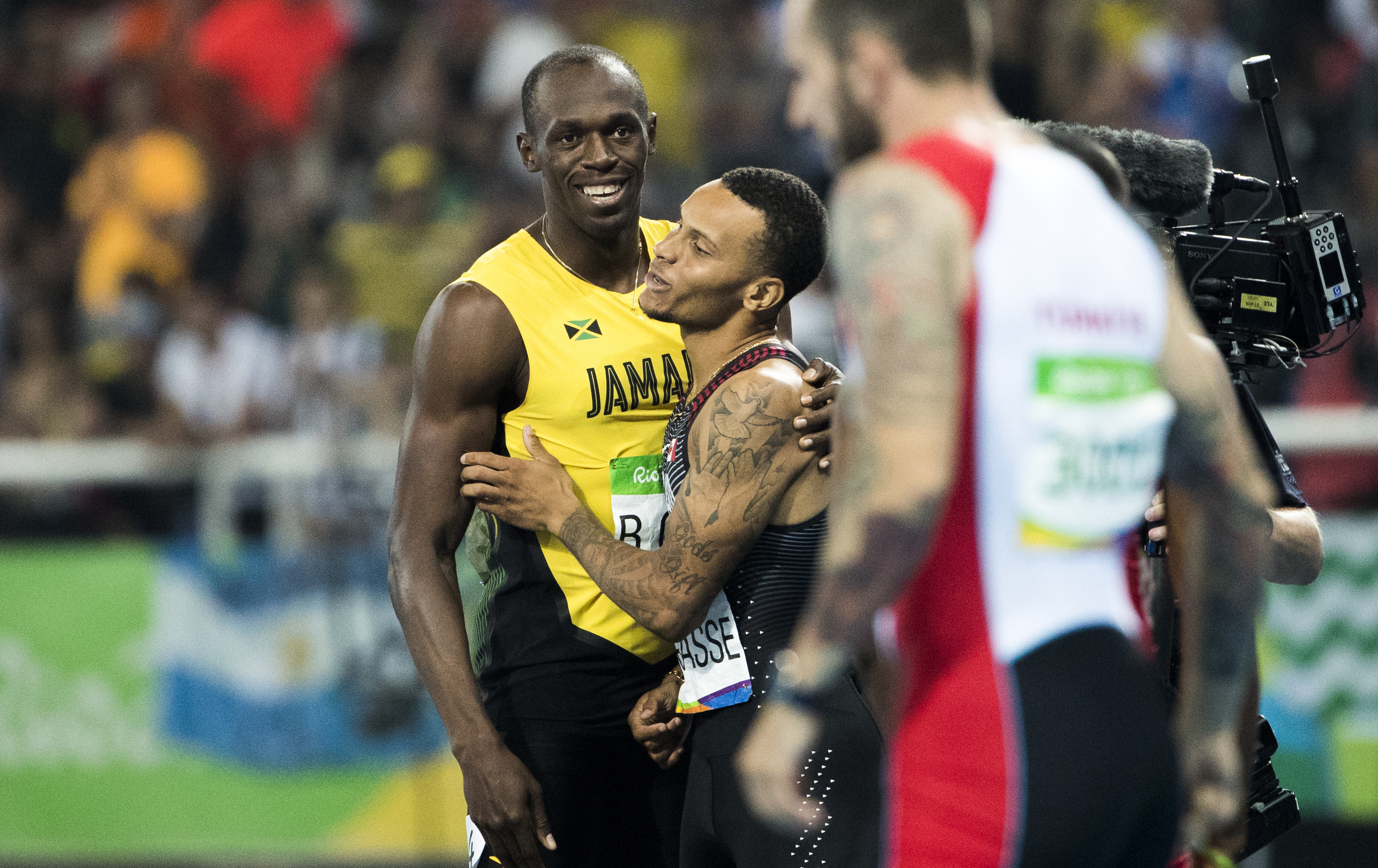 Andre De Grasse and Usain Bolt compete in the Men's 200m Semi Final at the Olympic Games in Rio de Janeiro, Brazil, Wednesday, August 17, 2016. COC Photo by Stephen Hosier