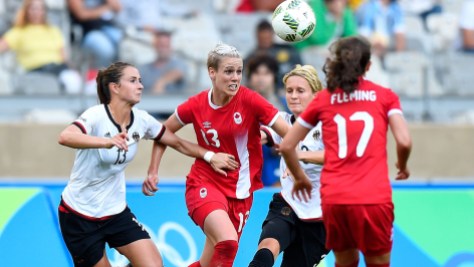 Rio 2016: Sophie Schmidt Sophie Schmidt (13) of Canada battles for a ball against Germany in the Olympic football semifinals on August 16, 2016.