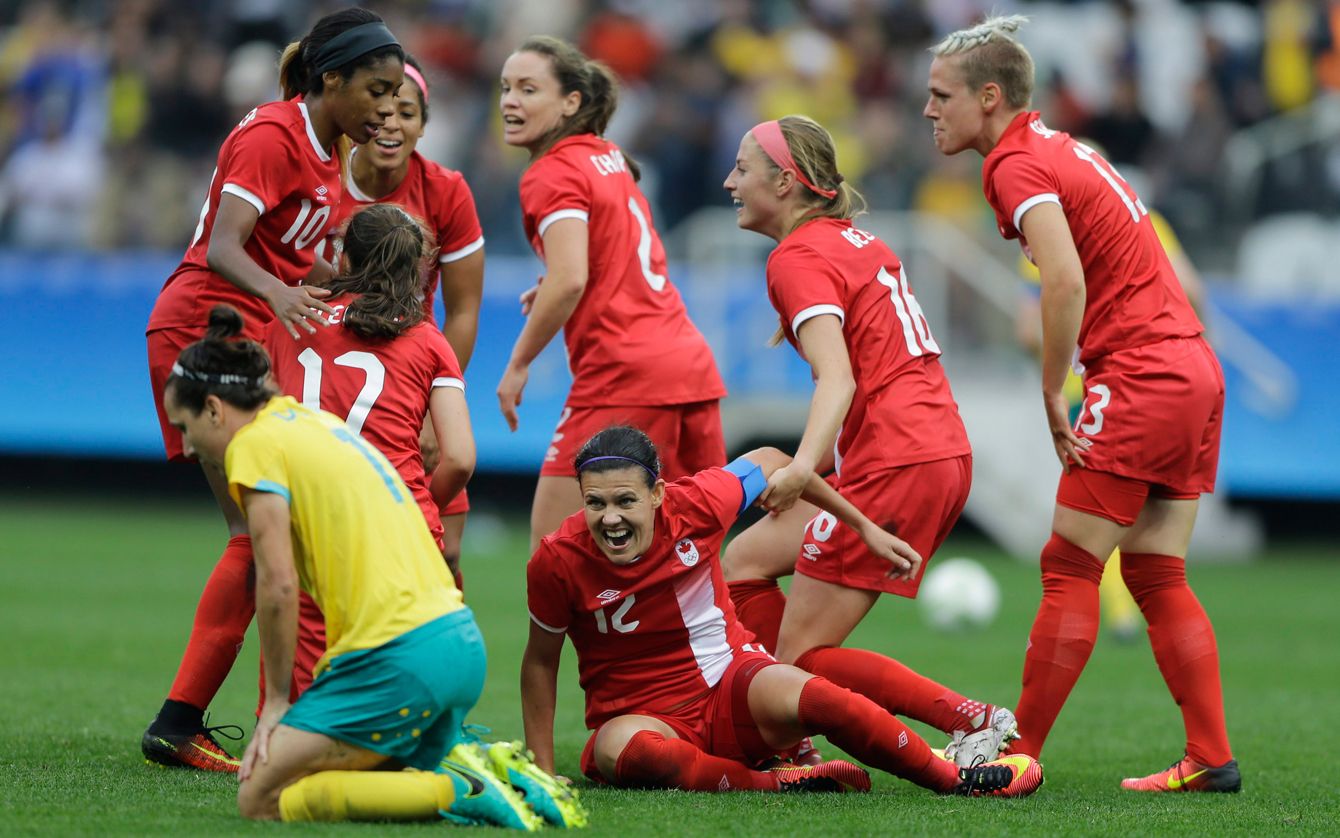 Canada's Christine Sinclair, center, celebrates with teammates after scoring her team's second goal during the 2016 Summer Olympics football match at the Arena Corinthians in Sao Paulo, Brazil, Wednesday, Aug. 3, 2016. Canada won 2-0. (AP Photo/Nelson Antoine)